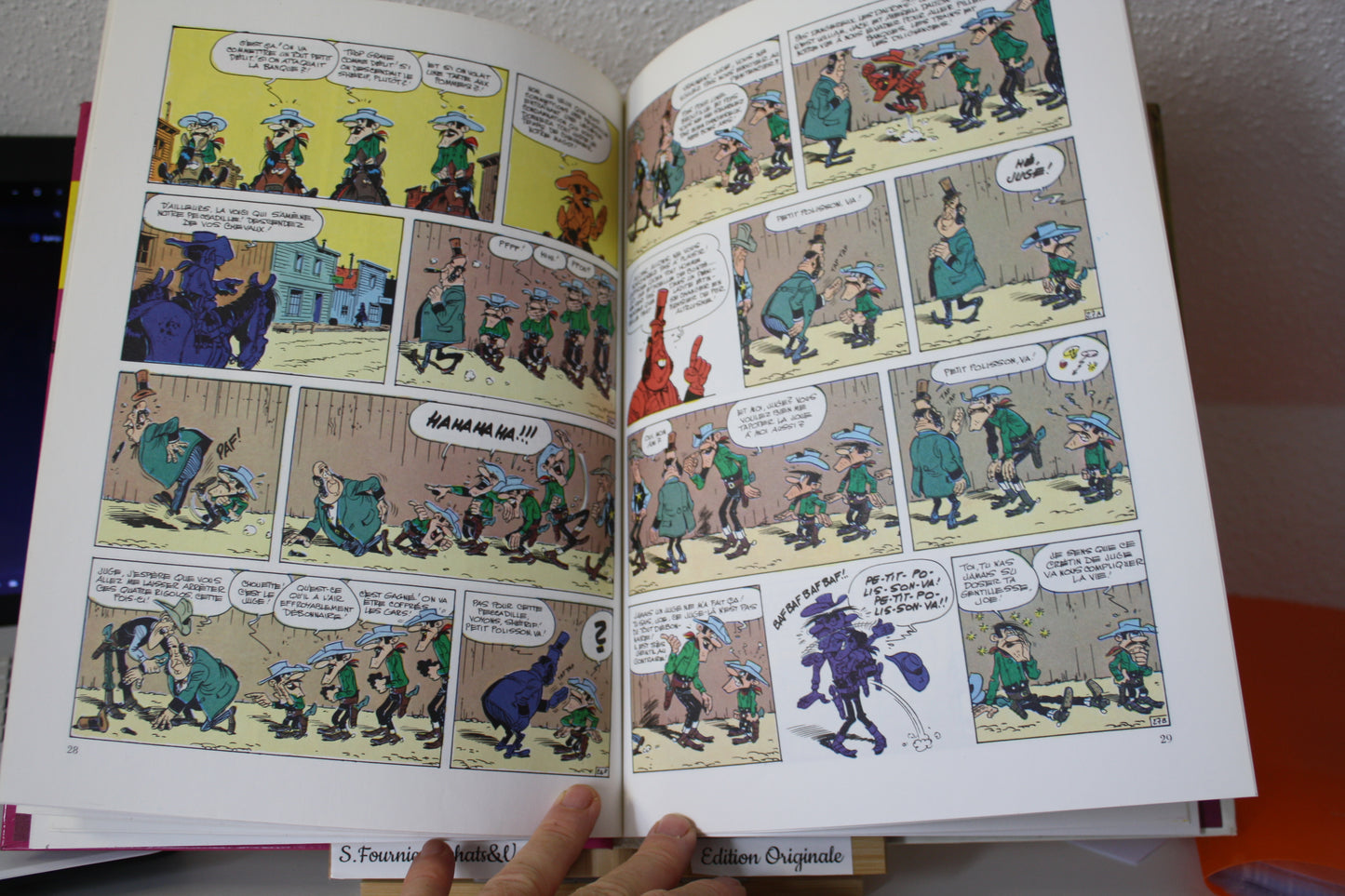 Le magot des Dalton – Lucky Luke – Morris - Dargaud Editeur - EO – 1987 - Abimé