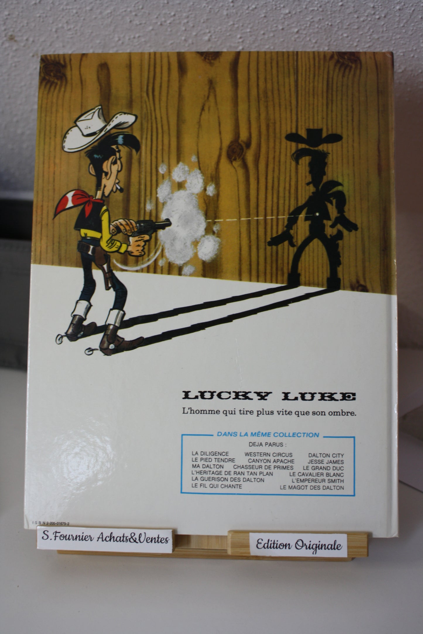 Le magot des Dalton – Lucky Luke – Morris - Dargaud Editeur - EO – 1987 - Abimé