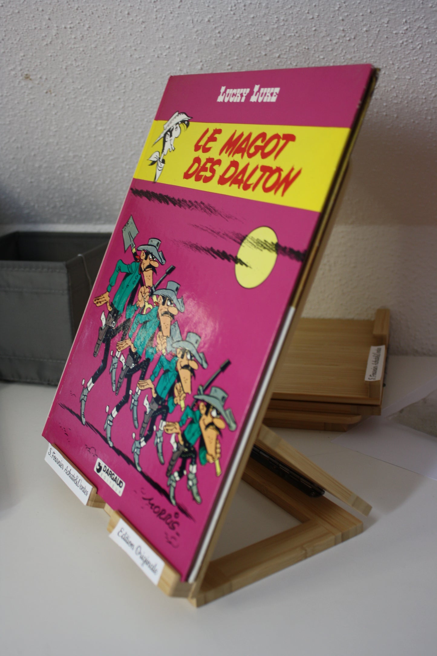 Le magot des Dalton – Lucky Luke – Morris - Dargaud Editeur - EO – 1987 - Abimé