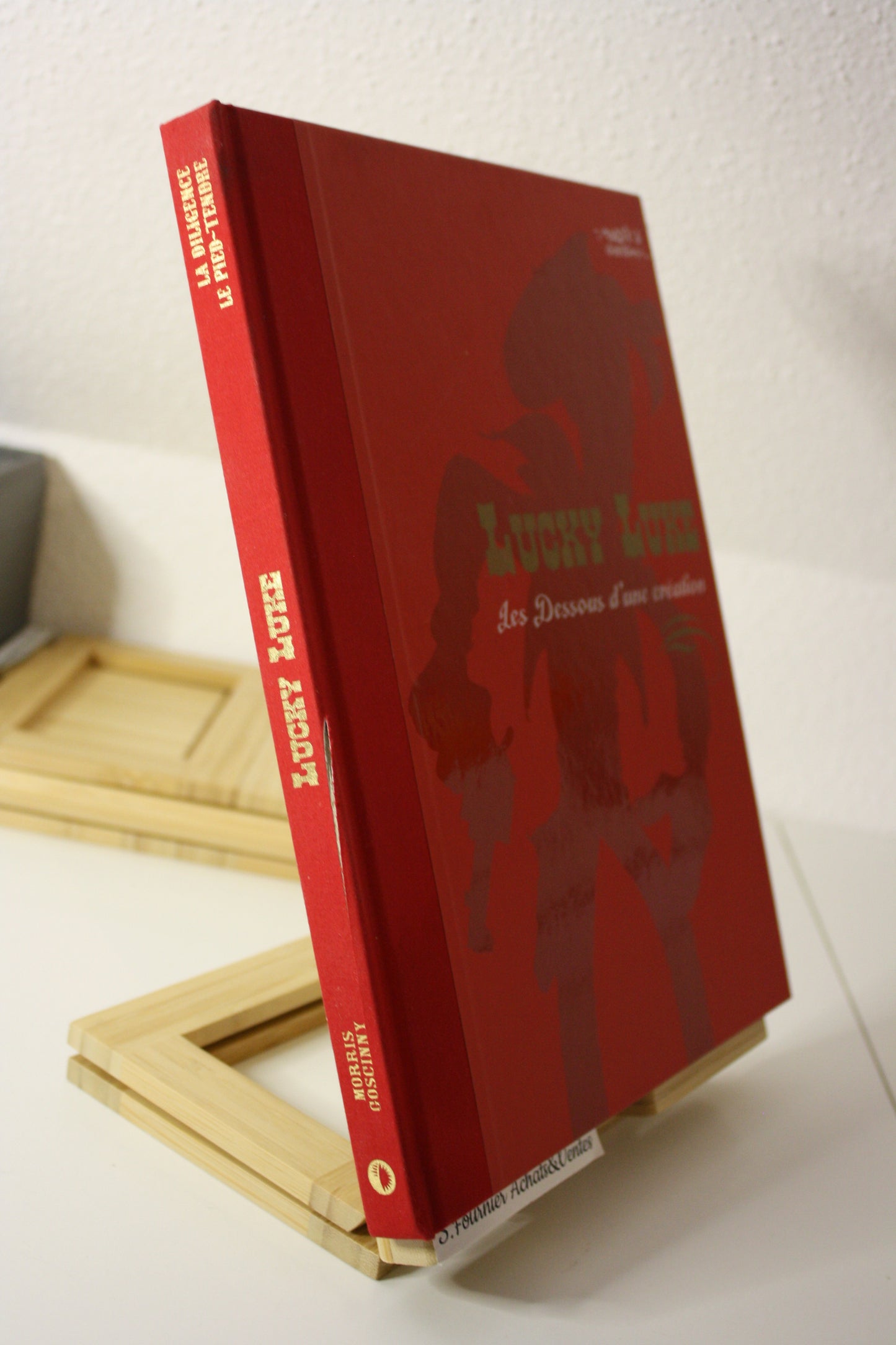 Les dessous d’une création : la diligence et pied tendre- Lucky Luke – Caroline Richter bonini – Atlas – Réédition – 2009 – Abimé