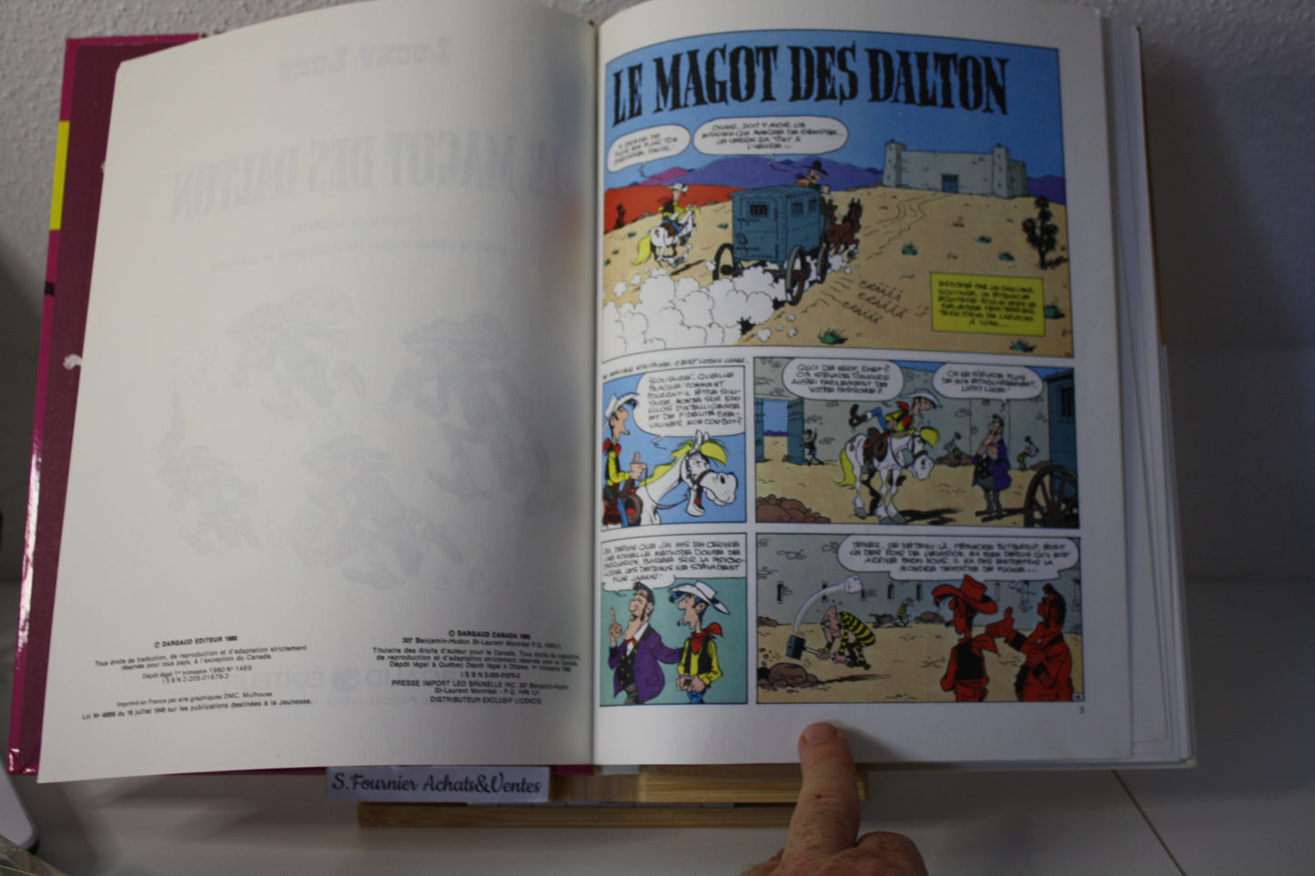 Le magot des Dalton – Lucky Luke – Morris - Dargaud Editeur - EO – 1987 - Abimé