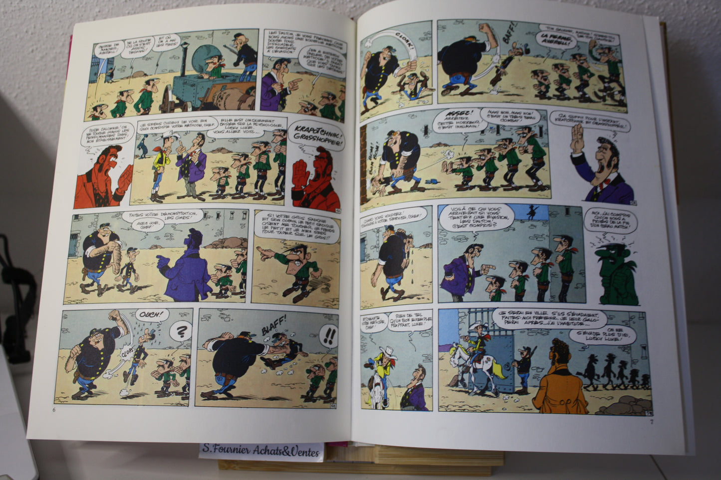 Le magot des Dalton – Lucky Luke – Morris - Dargaud Editeur - EO – 1987 - Abimé