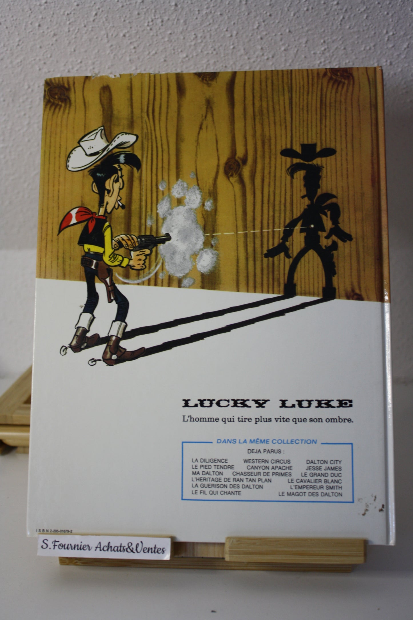 Le magot des Dalton – Lucky Luke – Morris - Dargaud Editeur - EO – 1987 - Abimé