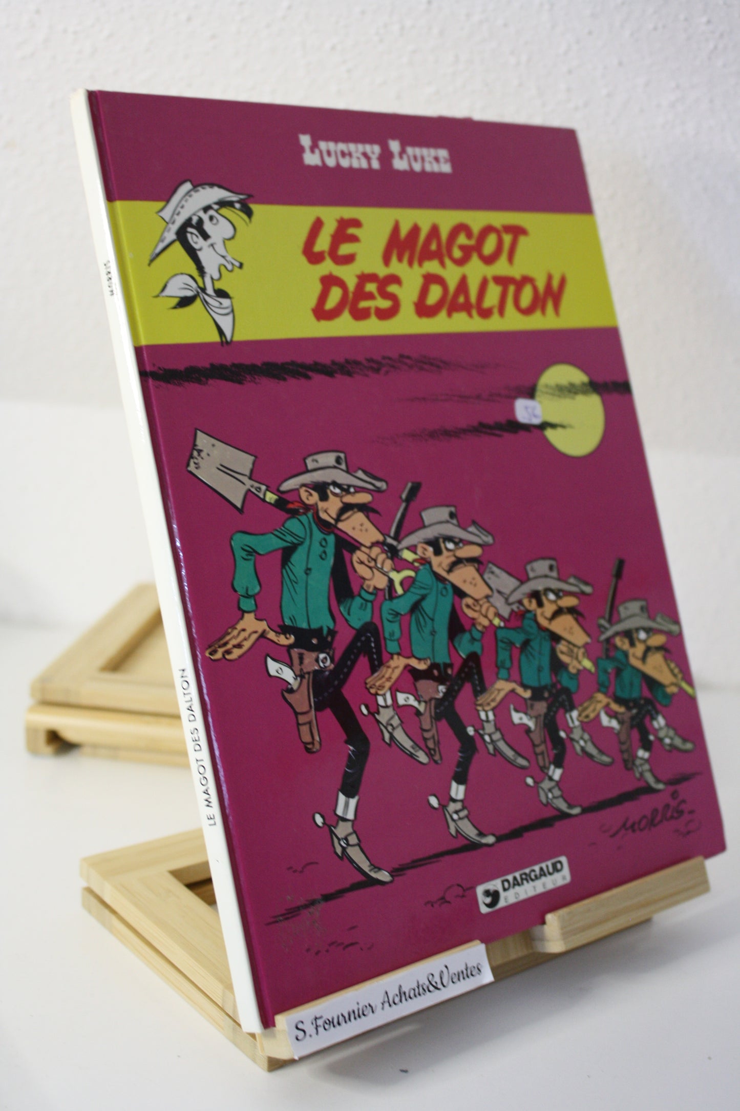Le magot des Dalton – Lucky Luke – Morris - Dargaud Editeur - EO – 1987 - Abimé