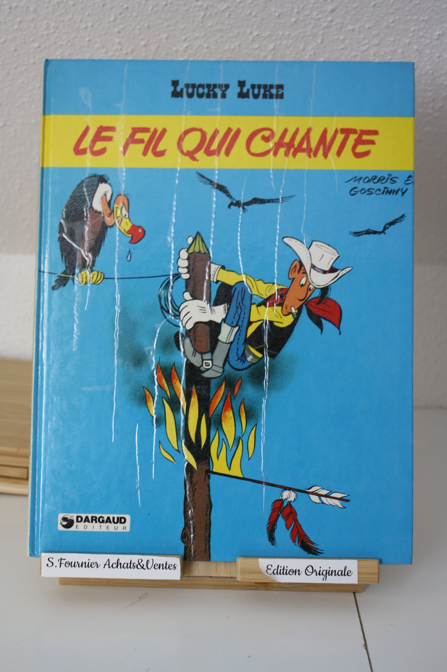 Le fil qui chante – Lucky Luke – Morris Goscinny – Dargaud Editeur – EO – 1977 – Plats abimé
