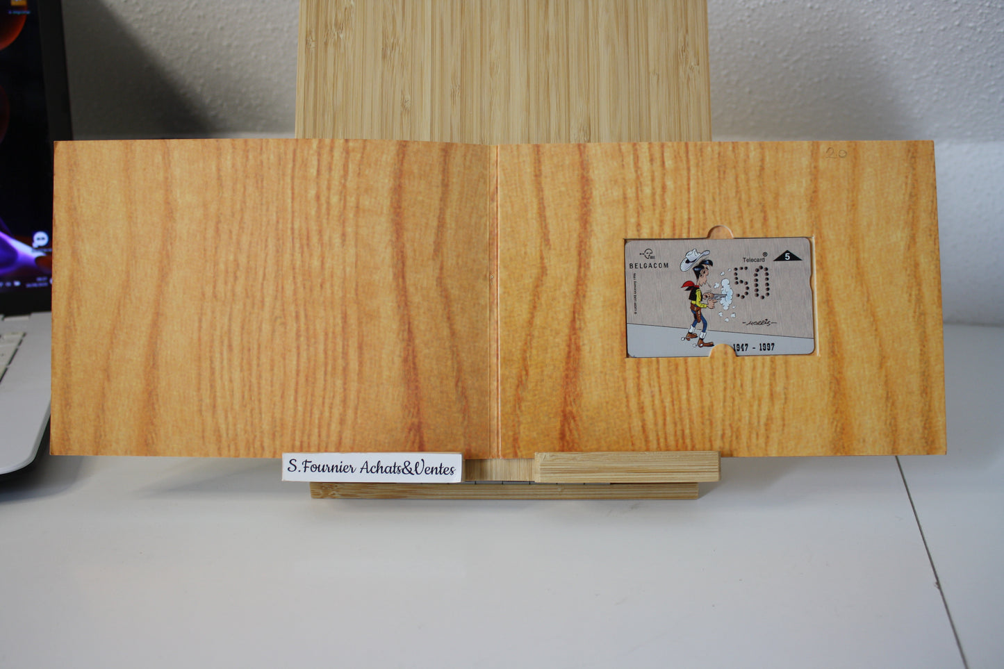Télécarte numéroté 0028 + Présentoir – Lucky Luke – Belgacom – Belgacom – Objet dérivé – 1996 – Edition limité à 2000