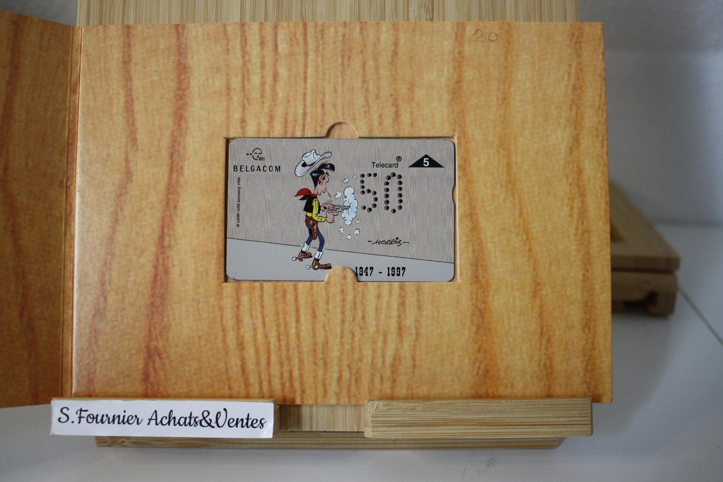 Télécarte numéroté 0028 + Présentoir – Lucky Luke – Belgacom – Belgacom – Objet dérivé – 1996 – Edition limité à 2000