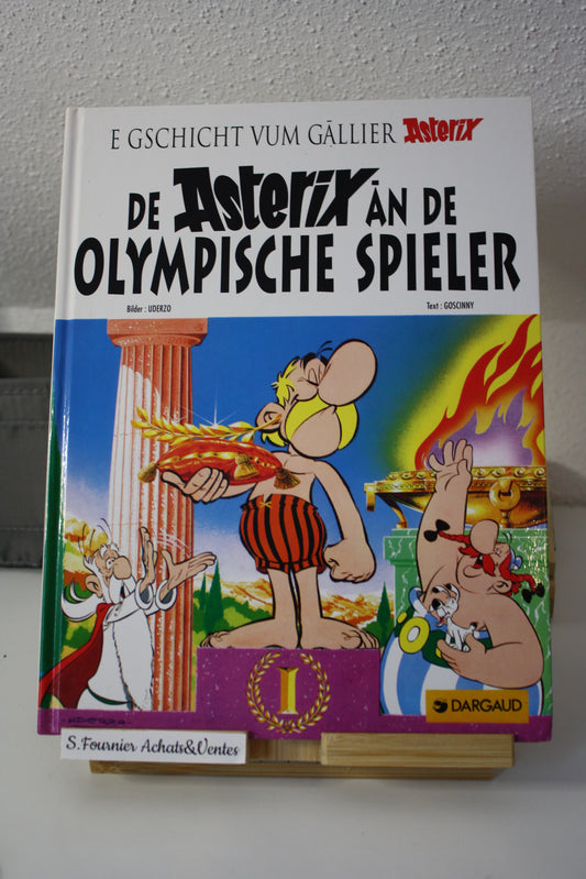 De Asterix an de olympische spieller  – Astérix – Goscinny Uderzo - Dargaud - Réédition  – 1996 - en Alsacien