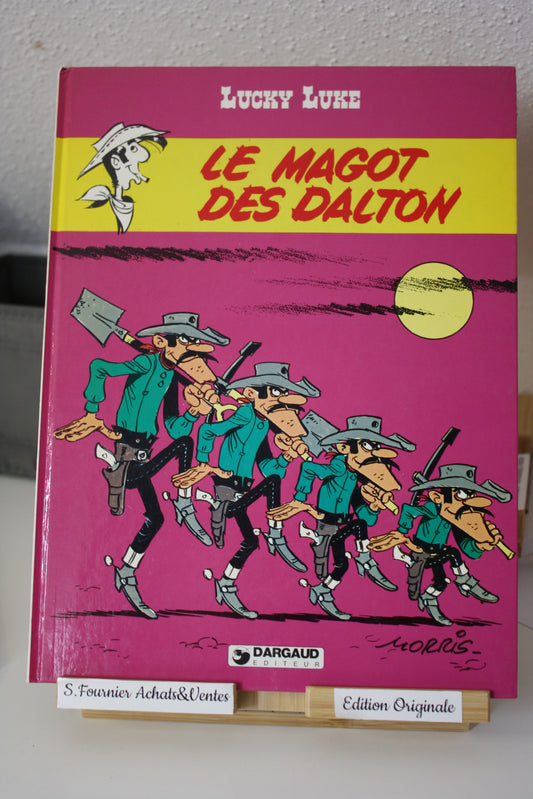 Le magot des Dalton – Lucky Luke – Morris - Dargaud Editeur - EO – 1987 - Abimé
