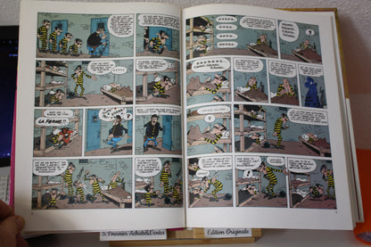 Le magot des Dalton – Lucky Luke – Morris - Dargaud Editeur - EO – 1987 - Abimé
