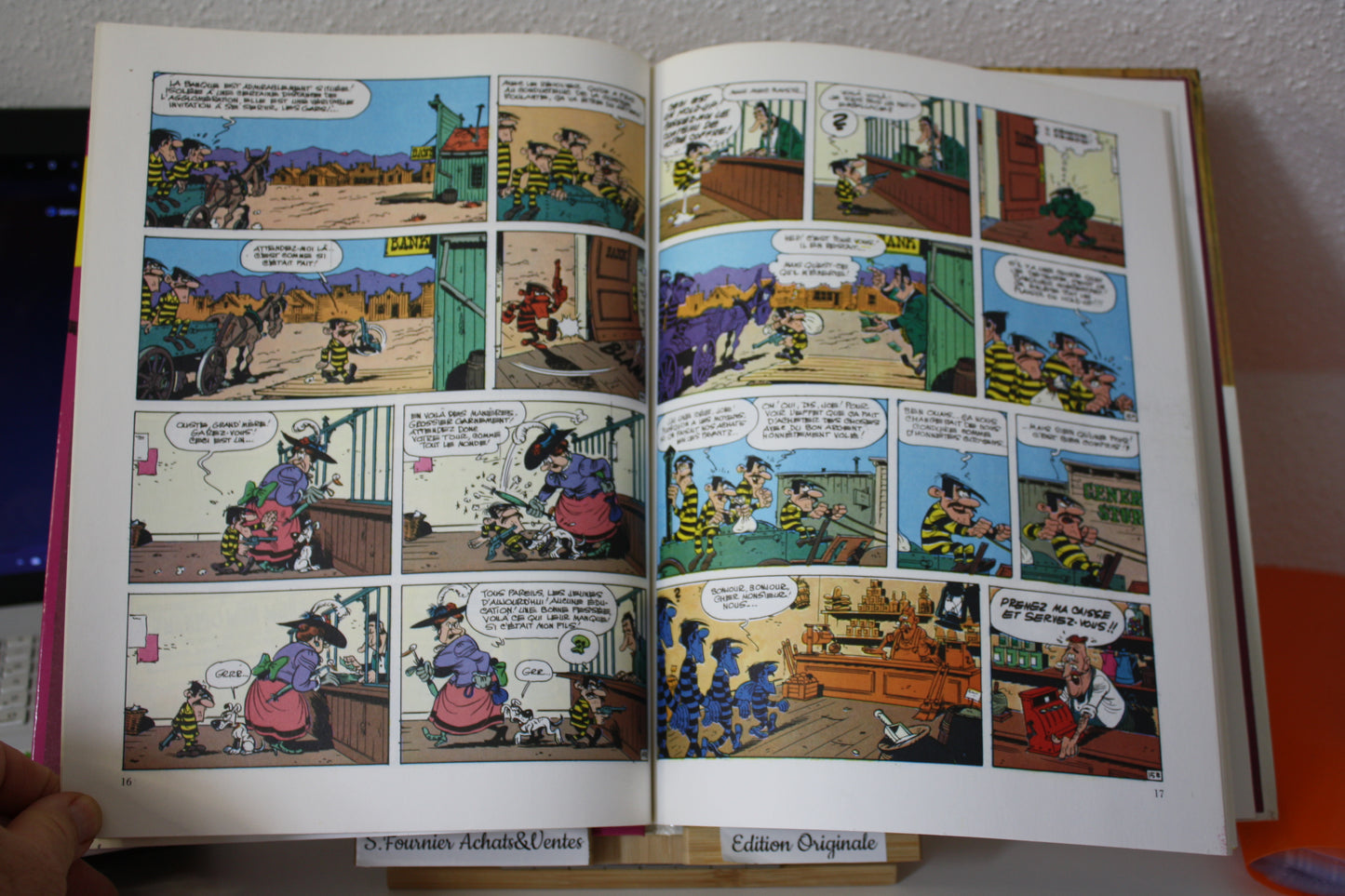 Le magot des Dalton – Lucky Luke – Morris - Dargaud Editeur - EO – 1987 - Abimé