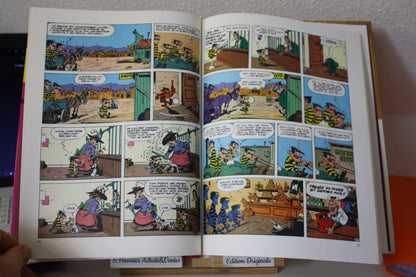 Le magot des Dalton – Lucky Luke – Morris - Dargaud Editeur - EO – 1987 - Abimé
