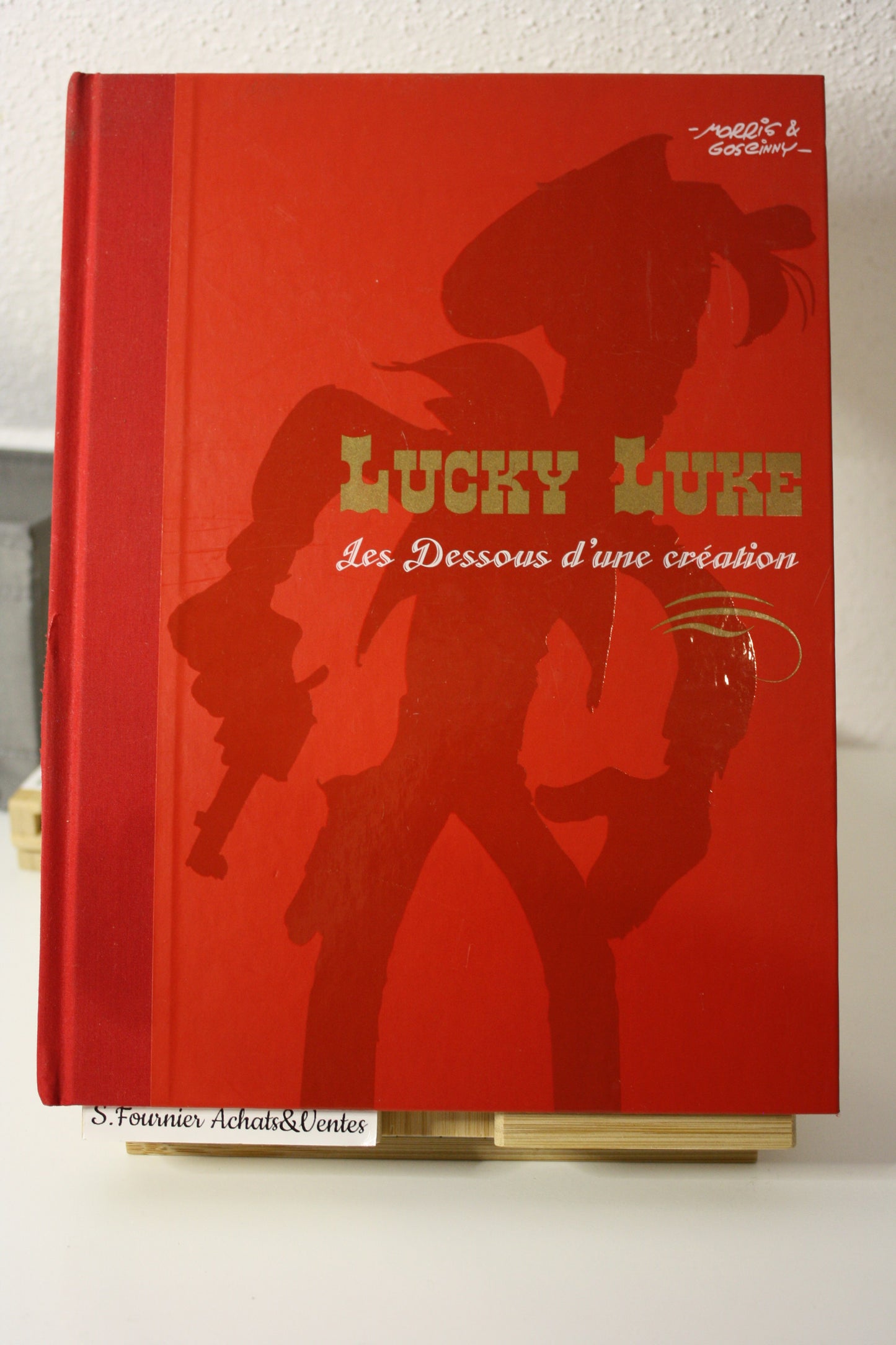Les dessous d’une création : la diligence et pied tendre- Lucky Luke – Caroline Richter bonini – Atlas – Réédition – 2009 – Abimé