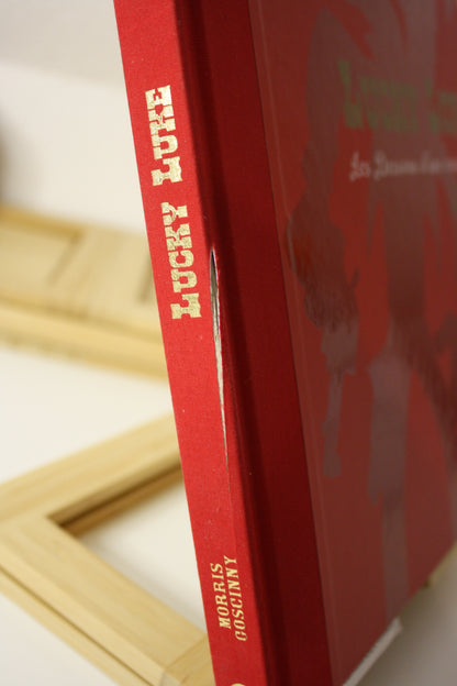 Les dessous d’une création : la diligence et pied tendre- Lucky Luke – Caroline Richter bonini – Atlas – Réédition – 2009 – Abimé