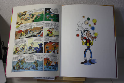 Le magot des Dalton – Lucky Luke – Morris - Dargaud Editeur - EO – 1987 - Abimé