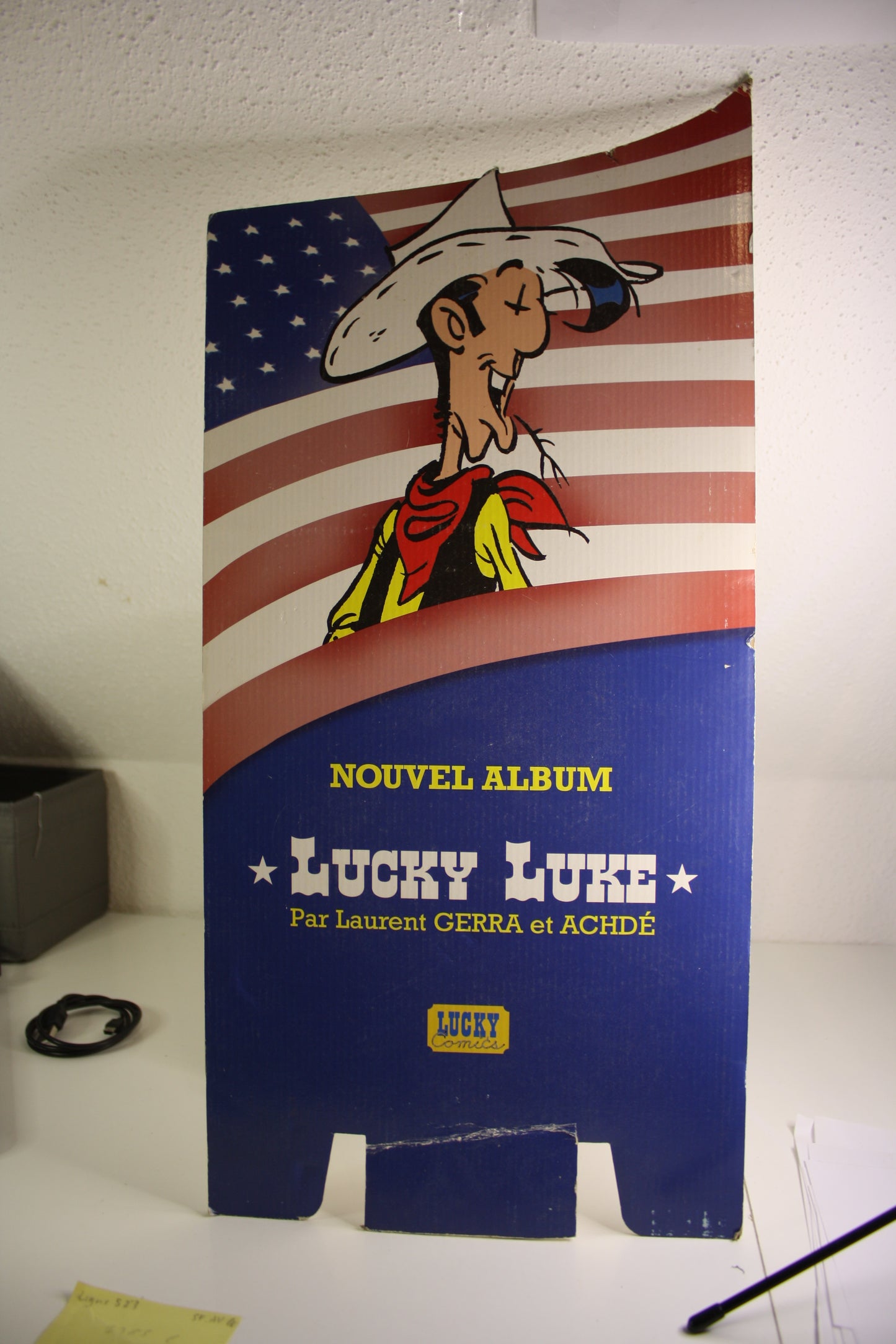 Haut d’un PLV pour Noël offrez vous un président – Lucky Luke – Morris – ? – Objet dérivé – 19??